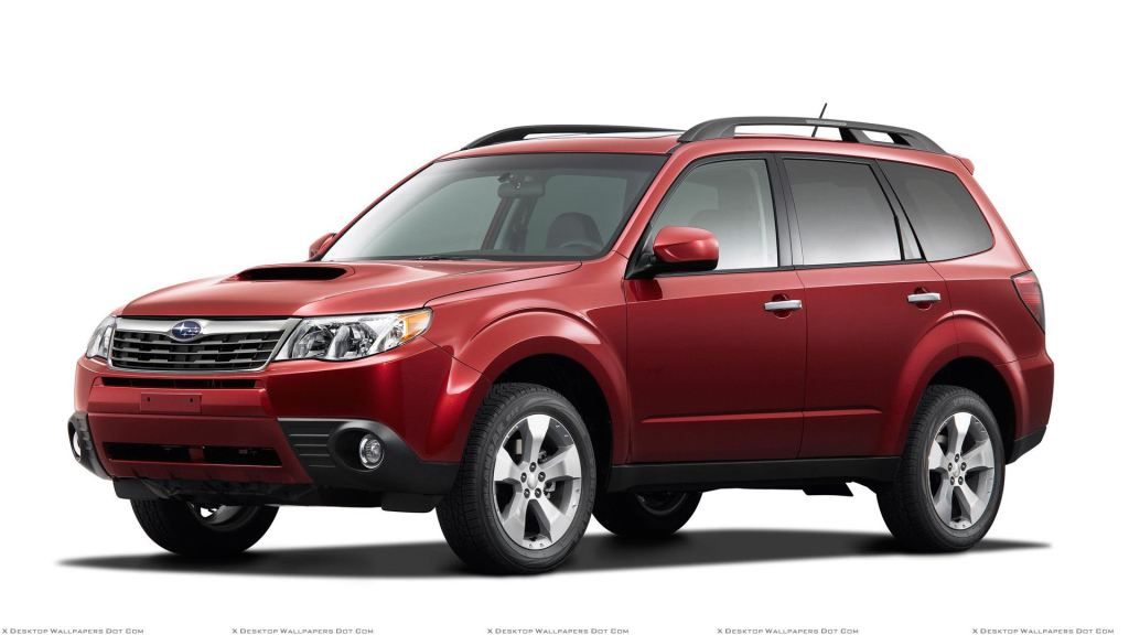 2009SubaruForester25XTInRedFrontSidePoseNWhiteBackground.jpg